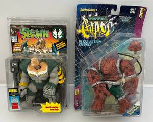 lot 77 image: Misc. McFarlanes Action Figures (NOC) Cards Are Beat Up