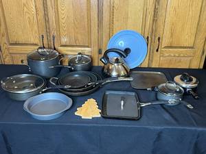 lot 34 image: Assorted Kitchen Cookware Set with Pans, Pots, and Kettle