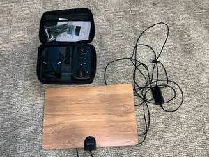 lot 52 image: Drone with Remote Control and Charging Pad