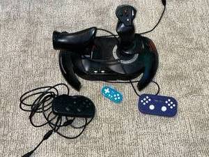 lot 54 image: Thrustmaster Flight Stick and Assorted Game Controllers Bundle