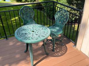 lot 7 image: Green Plastic Patio Bistro Set with Table and Two Chairs