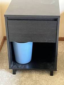 lot 65 image: Black Nightstand with Drawer and Open Shelf and Small Trash Can