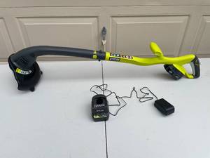 lot 148 image: Ryobi 18V Cordless String Trimmer P2003