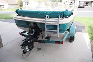 lot 2 image: 1998 Glastron SE175 bowrider with Mercruiser 3.0 4 cylinder inboard and Alpha Gen 1 outdrive and Matching Utility Boat Trailer