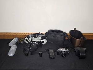 lot 199 image: Minolta X-370 SLR Film Camera Bundle with Flash, Bag, and Accessories (untested)