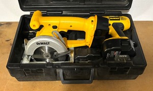 lot 83 image: DeWalt DW935 Trim Saw and DW991 Adjustable Clutch Cordless Drill