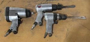 lot 148 image: Three  Pneumatic Tools