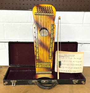 lot 171 image: Uke Stringed Instrument by Marxochime Colony