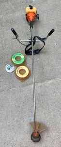 lot 268 image: Stihl Weed Wacker and Extra Trimmer Line