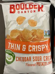 lot 14 image: Boulder Canyon Thin & Crispy Cheddar Sour Cream Flavored Potato Chips - 4 Pack