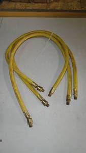 lot 79 image: Set of 3 Goodyear 3 x 38 Rubber Whip Hose Yellow 250 Psi with Swivel Fitting