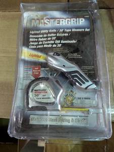 lot 133 image: MasterGrip - Lighted Utility Knife30 Tape Measure