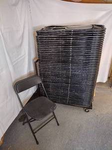 lot 28 image: (50) EventXpress C600 folding chairs. Black seat and back on a black steel frame