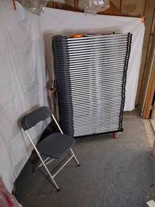 lot 54 image: (52) Stackable Folding Chairs, Gray seat and back on a silver steel frame. 