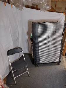 lot 57 image: (50) Stackable Folding Chairs, Gray seat and back on a silver steel frame. 