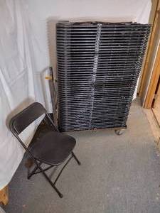lot 32 image: (50) EventXpress C600 folding chairs, black seatback on black steel frame. 