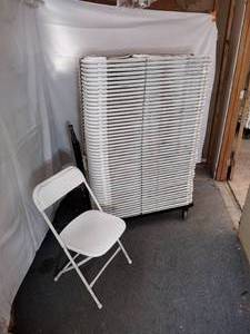 lot 65 image: (50) Stackable Folding Chairs, white seat and back on a white steel frame.  