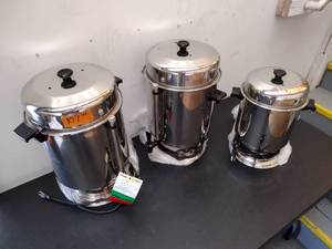 lot 107 image: Stainless Steel Electric Coffee Makers (2) 110-cup - Note one may have a leaky spout  (1) 55-cup