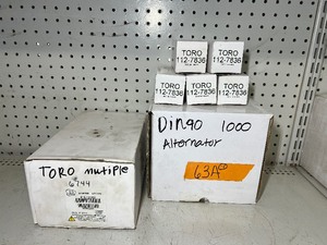 lot 63A image: Toro parts including J&N Electrical Products Alternator Mega-Fire Alternator  (5) Toro Inline Fuel Filter