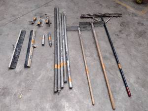 lot 204 image: Bull floats, rake, broom brush heads, and concrete hoe