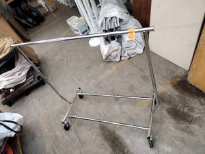 lot 214 image: Clothing rack with wheels