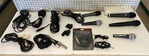 lot 201 image: (5) Microphones cordless & corded (8) Cords (2) Microphone clips