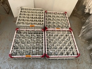 lot 189 image: Champagne and wine glasses, 85-100 in total. Gray racks are Vollrath.