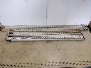 lot 229 image: Telescoping leveling rods for measuring elevation differences in Surveying