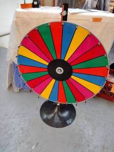 lot 236 image: Wheel of Fortune prize wheel, also known as a table top wheel of chance, 30 in diameter, 41 total height