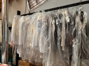 lot 249 image: Tablecloths & table skirts.  Tablecloths are brown & off-white