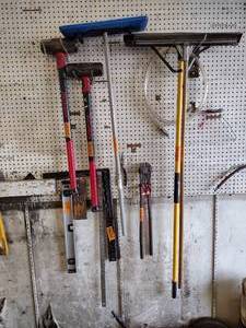lot 263 image: (2) Razorback Sledge hammers, Snow Joe, bent nose pliers, bolt cutter, squeegee, level, square rulers, 3-foot aluminum ruler, chipper blade