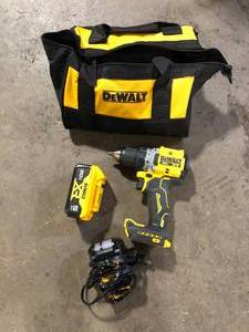 lot 13 image: DEWALT 20V MAX XR Lithium-Ion Cordless Compact 12 in. DrillDriver Kit, 20V MAX 5.0Ah Battery, and Charger  Customer Returns See Pictures