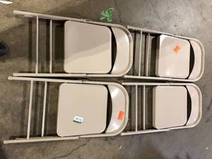 lot 14 image: Lot of Beige Metal Stackable Folding Chair Customer Returns See Pictures