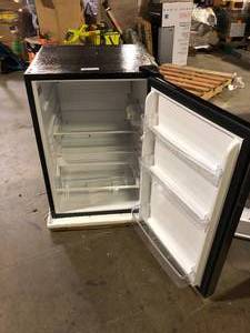 lot 35 image: Magic Chef 4.4 cu. ft. Mini Fridge in Stainless Steel Look without Freezer  Customer Returns See Pictures