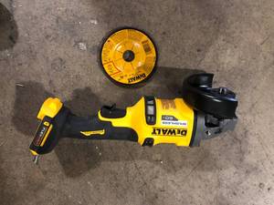 lot 10 image: DEWALT FLEXVOLT 60V MAX Cordless Brushless 4.5 in. to 6 in. Small Angle Grinder with Kickback Brake (Tool Only) Customer Returns See Pictures