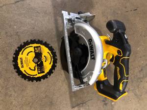 lot 23 image: DEWALT 20V MAX Cordless Brushless 6-12 in. Sidewinder Style Circular Saw (Tool Only)     Customer Returns See Pictures