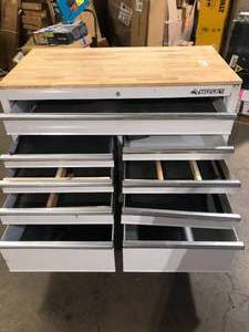 lot 37 image: Husky Tool Storage 46 in. W Gloss White Mobile Workbench Cabinet Damage on Side and No Keys Customer Returns See Pictures
