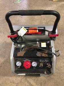 lot 41 image: Husky 4.5 Gal. 175 PSI Portable Electric Quiet Air Compressor For Parts Customer Returns See Pictures