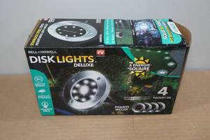 lot 39 image: Bell & Howell Solar Disc Light Set