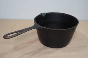 lot 109 image: Cast Iron 3-Quart Pot