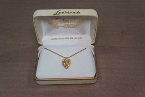 lot 257 image: Black Hills Gold Pendant with Gold Filled Chain