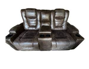 Electric Reclining Loveseat with Adjustable Headrests, USB ports and Plug Inserts, Center Console Storage, Side Storage and Cup Holders. Retails for $1700