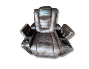 Electric Reclining Chair Featuring Storage Compartments, USB Ports, Built In Bluetooth Speakers. Measuring 36 x 39 x 44. Retails for $700