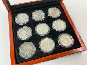 lot 6 image: 9 Different Silver Morgan Dollars in Cherrywood Box
