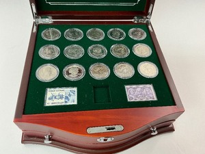 lot 9 image: 17pc Susan B. Anthony Coin and Stamp Collection Centennial Edition