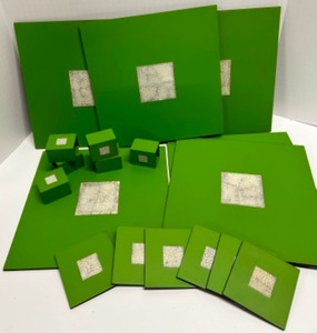 lot 56 image: Asian Modern Green Lacquered Wood Placemat, Coaster & Napkin Ring Set in Black Storage Box