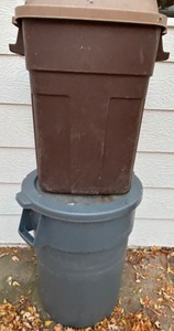 lot 83 image: Two Heavy Duty Rubbemade Roughneck & Uline Brute Covered Trash  Storage Cans