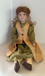 lot 91 image: Vintage 1993 Fannie Turgeon Composition Doll Glass Eyes Wig and Vintage Clothing Signed