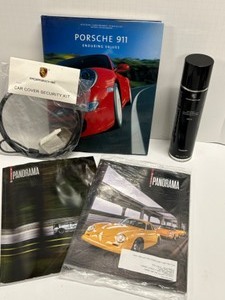 lot 36 image: Vintage PORSCHE Collectible Items Including Magazines, a Book & Care Items