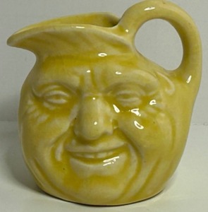 lot 103 image: Vintage Man in the Moon FACE JUG Miniature PITCHER In Yellow Glazed Pottery Souvenir